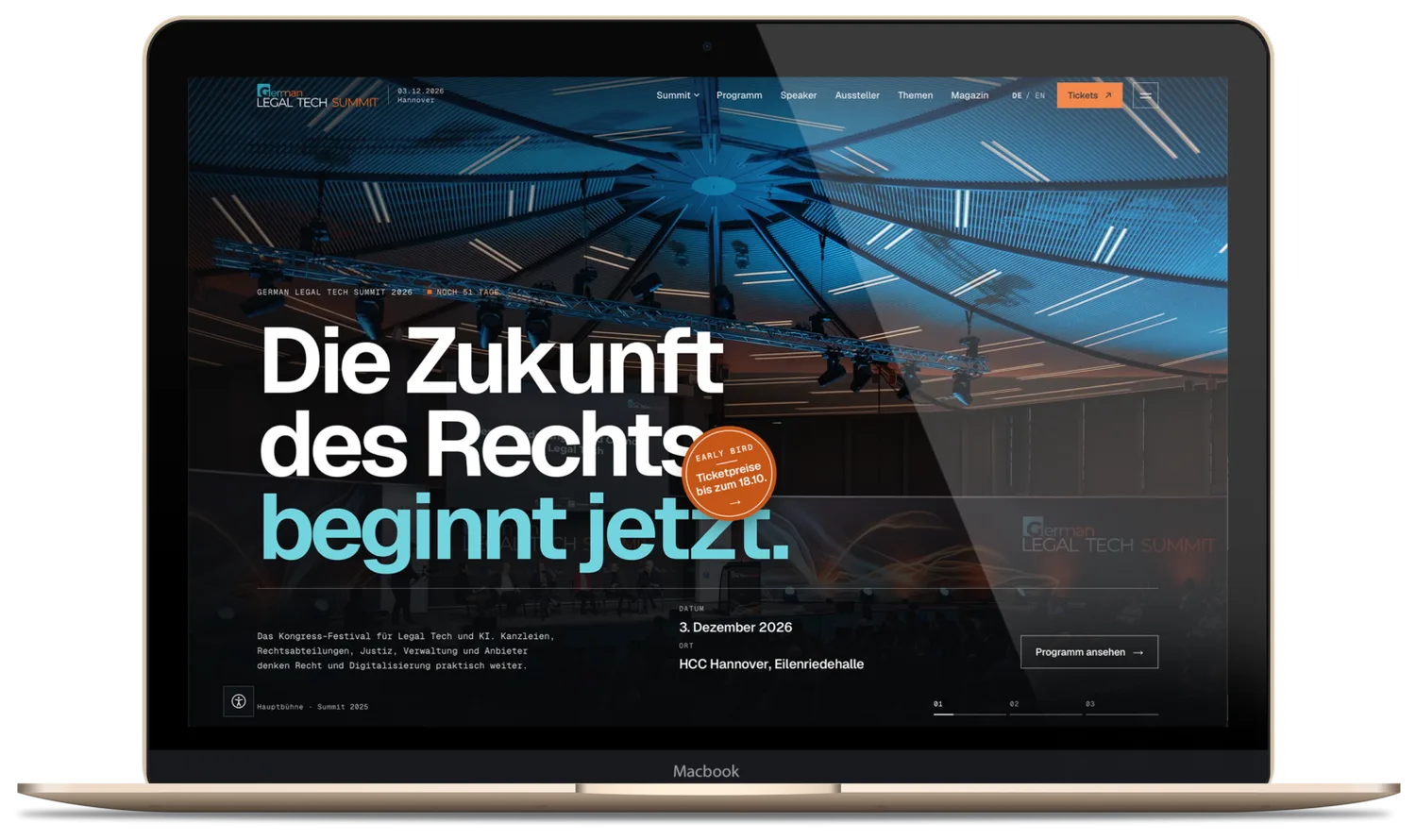The German Legal Tech Summit home page on a laptop